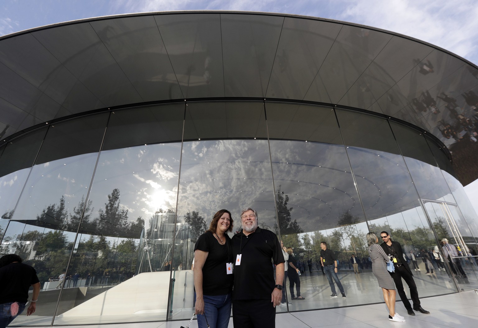Apple co-founder Steve Wozniak and his wife, Janet Wozniak, arrive for a new product announcement at the Steve Jobs Theater on the new Apple campus, Tuesday, Sept. 12, 2017, in Cupertino, Calif. (AP P ...