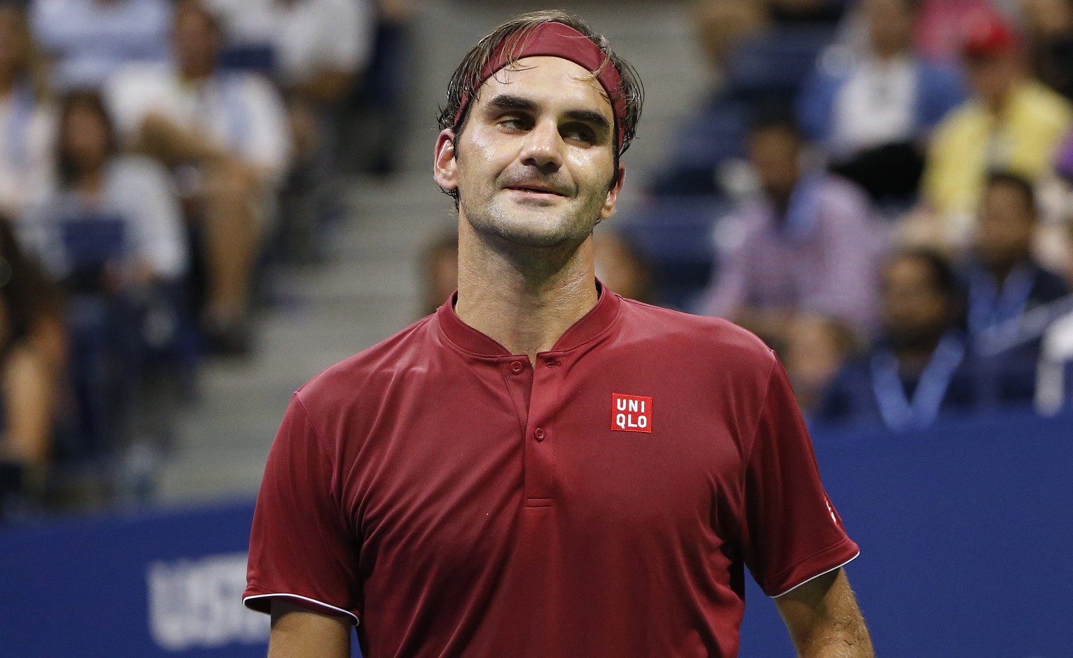 Roger Federer, of Switzerland, reacts after losing a point to John Millman, of Australia, during the fourth round of the U.S. Open tennis tournament, Monday, Sept. 3, 2018, in New York. (AP Photo/Jaso ...