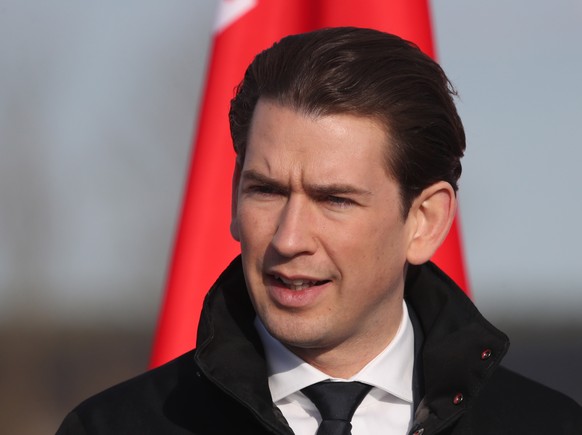epa07469267 Austrian Chancellor Sebastian Kurz talks during an opening of a monument &#039;Mass of names&#039; near the village of Trostenets, on the outskirts of Minsk, Belarus, 28 March 2019. The mo ...