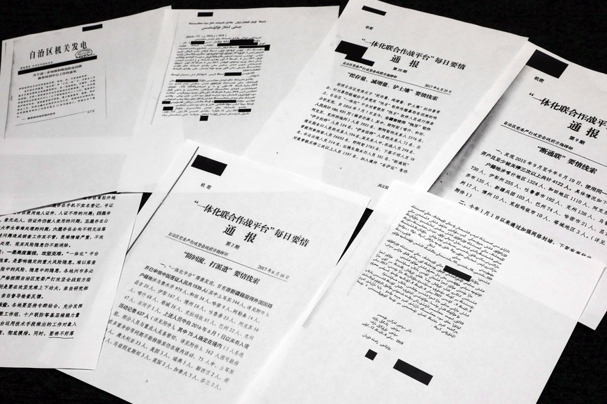 A sample of classified Chinese government documents leaked to a consortium of news organizations, is displayed for a picture in New York, Friday, Nov. 22, 2019. Beijing has detained more than a millio ...