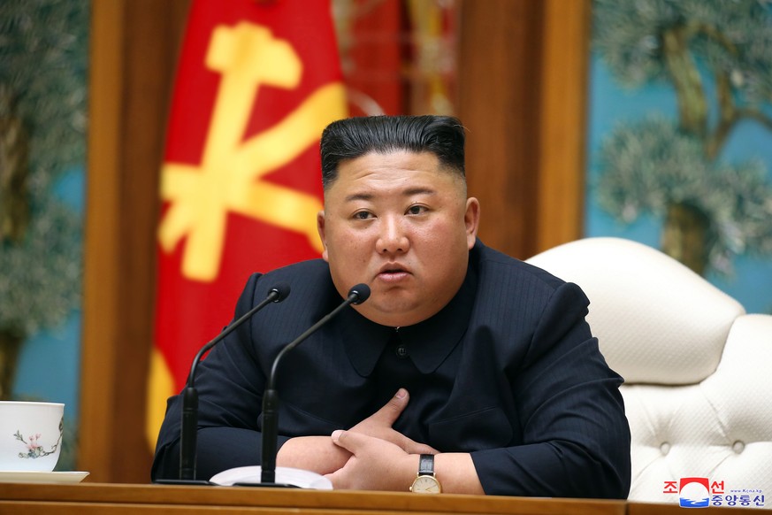 epa08374708 A photo released by the official North Korean Central News Agency (KCNA) shows North Korean leader Kim Jong Un attending a politburo meeting of the ruling Workers&#039; Party of Korea in P ...