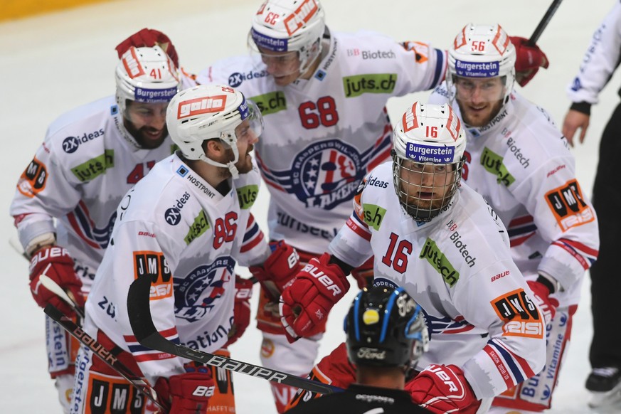 Rapperswil&#039;s player Martin Ness, right, celebrate with team mate 0-1 goal, during the regular season game of the National League Swiss Championship 2018/19 between HC Lugano and SC Rapperswil-Jon ...