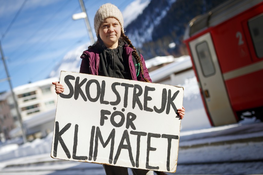 16 year-old Swedish climate activist Greta Thunberg arrives to attend the 49th Annual Meeting of the World Economic Forum, WEF, in Davos, Switzerland, Wednesday, January 23, 2019. Starting the first s ...