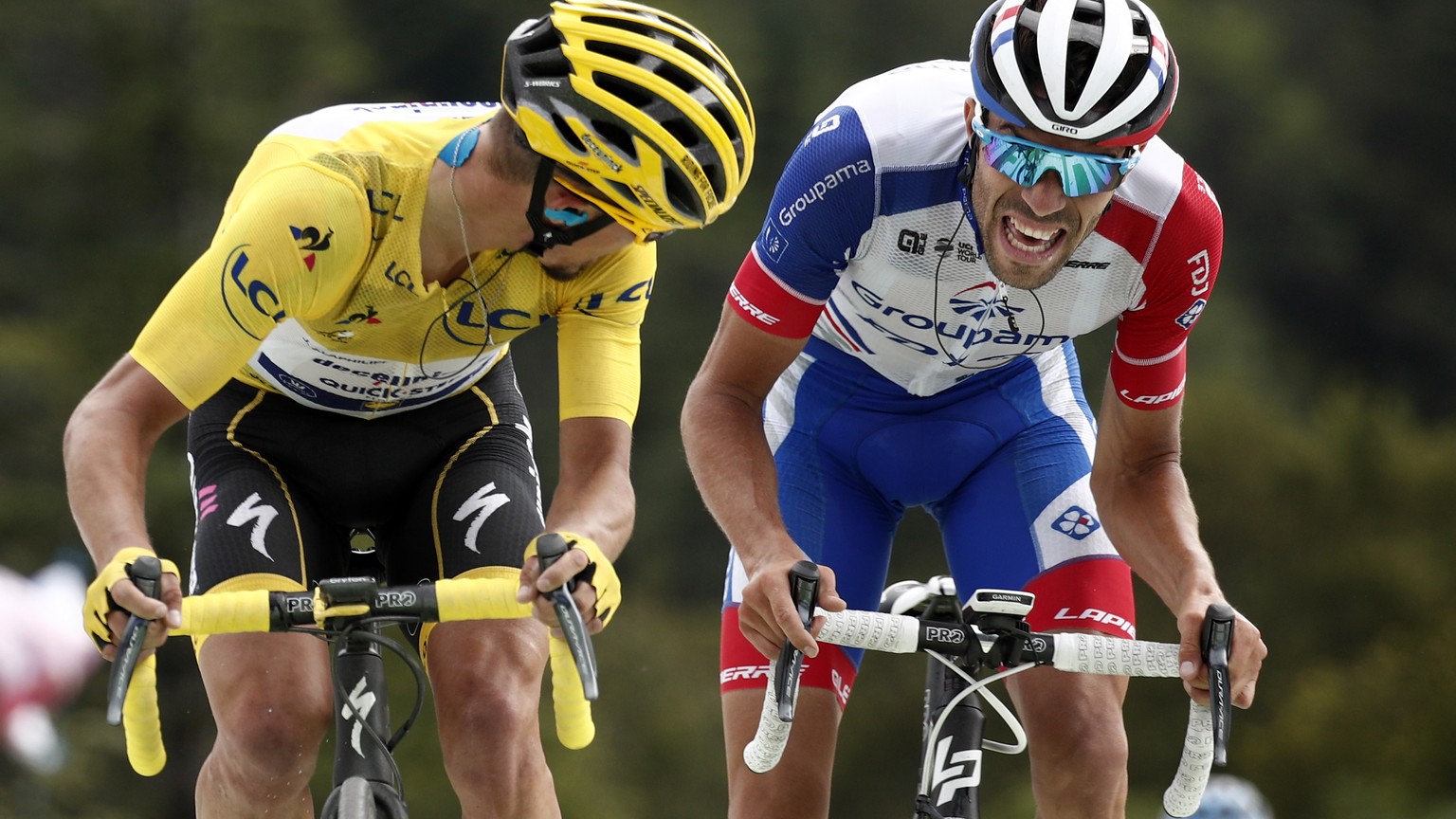 epa07710453 France&#039;s Julian Alaphilippe (L) of Deceuninck Quick Step team and France&#039;s Thibaut Pinot (R) of Groupama Fdj team cross the finish line during the 6th stage of the 106th edition  ...