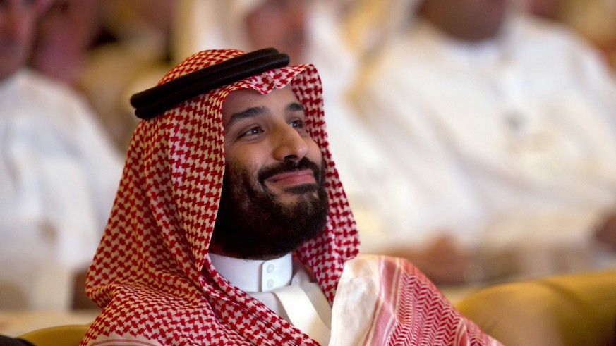 Saudi Crown Prince, Mohammed bin Salman, smiles as he attends the Future Investment Initiative conference, in Riyadh, Saudi Arabia, Tuesday, Oct. 23, 2018. The high-profile economic forum in Saudi Ara ...