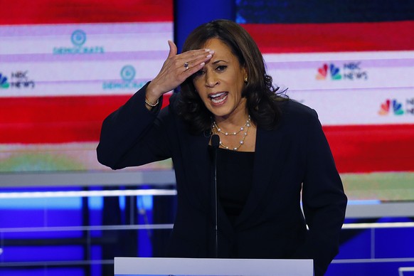 Democratic presidential candidate Sen. Kamala Harris, D-Calif., gestures during the Democratic primary debate hosted by NBC News at the Adrienne Arsht Center for the Performing Art, Thursday, June 27, ...