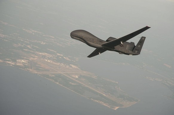 epa07659405 A handout photo made available by the US Navy provided by Northrop Grumman, a RQ-4 Global Hawk unmanned aerial vehicle conducts tests over Naval Air Station Patuxent River, Maryland, USA 2 ...