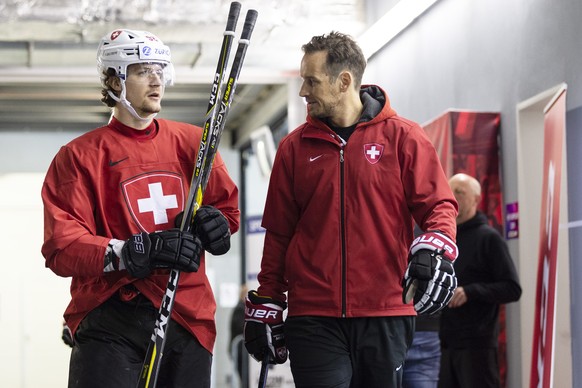 Switzerland&#039;s Gaetan Haas and Switzerland&#039;s coach Patrick Fischer during a training session of the Swiss team at the IIHF 2019 World Ice Hockey Championships, at the Ondrej Nepela Arena in B ...