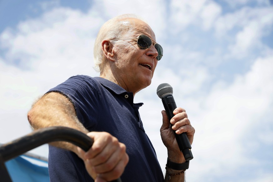 In this Aug. 8, 2019, photo, Democratic presidential candidate former Vice President Joe Biden speaks at the Des Moines Register Soapbox during a visit to the Iowa State Fair in Des Moines, Iowa. Thre ...