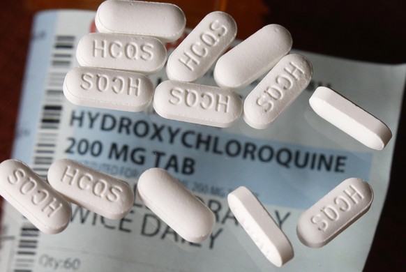 This Monday, April 6, 2020, photo shows an arrangement of hydroxychloroquine pills in Las Vegas. President Donald Trump and his administration kept up their out-sized promotion Monday of an malaria dr ...