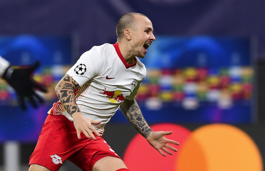 epa08871195 Angelino of Leipzig celebrates after scoring the opening goal in the UEFA Champions League group H soccer match between RB Leipzig and Manchester United in Leipzig, Germany, 08 December 20 ...