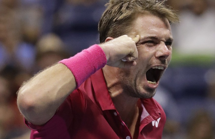 Stan Wawrinka, of Switzerland, reacts after winning the third set against Kei Nishikori, of Japan, during the semifinals of the U.S. Open tennis tournament, Friday, Sept. 9, 2016, in New York. (AP Pho ...