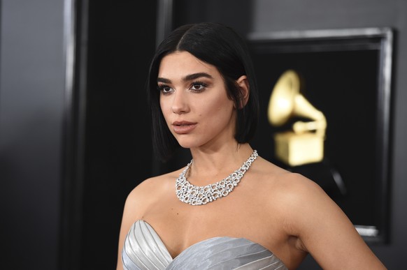 FILE - In this Sunday, Feb. 10, 2019 file photo, Dua Lipa arrives at the 61st annual Grammy Awards at the Staples Center in Los Angeles. Home-grown talents Dua Lipa, Anne-Marie and George Ezra lead no ...