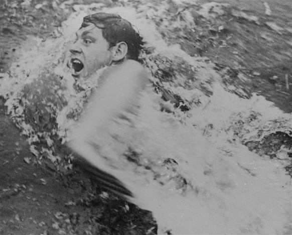 FILE - In this November 1928 file photo, Johnny Weissmuller is shown competing in an international swimming tournament at the Tamagawa pool on the outskirts of Tokyo. In an amateur career spanning eig ...