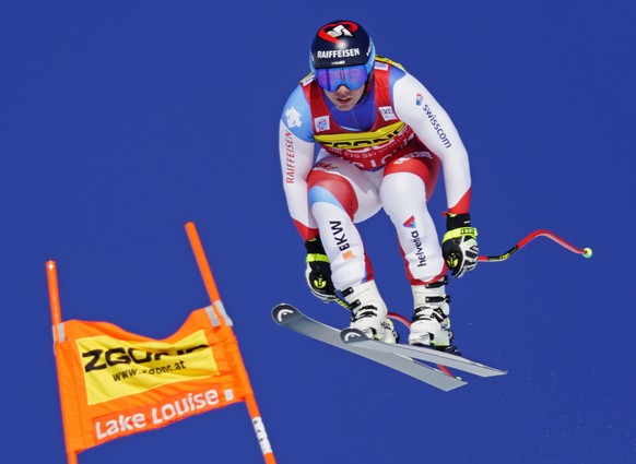 Beat Feuz of Switzerland skis down the course during the men&#039;s World Cup downhill ski race in Lake Louise, Alberta, Canada, on Saturday, Nov. 30, 2019. (Frank Gunn/The Canadian Press via AP)