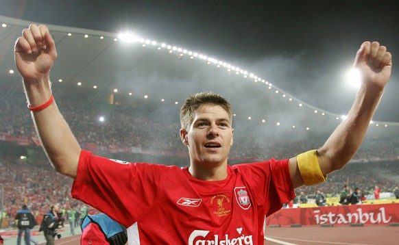 (FILES) A file picture taken on May 25, 2005, shows Liverpool&#039;s captain Steven Gerrard celebrating after a 3-2 victory over AC Milan in the final of the 2005 UEFA Champions League at the Ataturk  ...