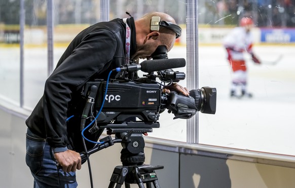 A camera man of TPC films during the Champions Hockey League group F match between Switzerland&#039;s SC Bern against Czech Republic&#039;s Mountfield Hradec Kralove in Bern, Switzerland, on Tuesday,  ...
