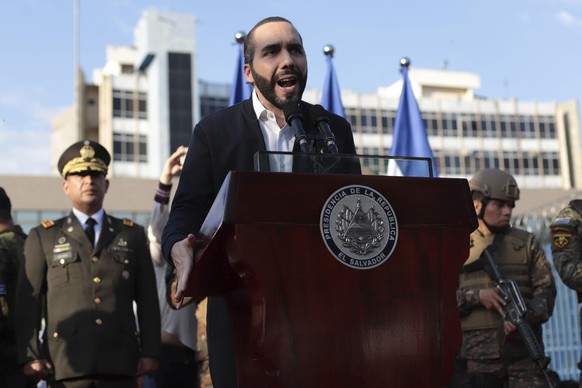 El Salvador&#039;s President Nayib Bukele, accompanied by members of the armed forces, speaks to his supporters outside Congress in San Salvador, El Salvador, Sunday, Feb. 9, 2020. Bukele has called o ...