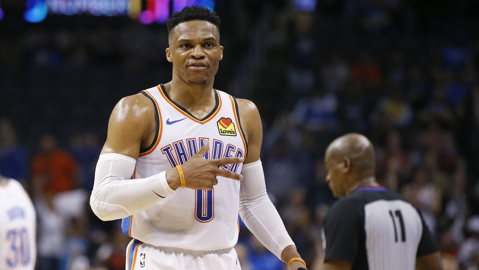 Oklahoma City Thunder guard Russell Westbrook (0) gestures to the crowd in the second half of an NBA basketball game against the Los Angeles Lakers, Tuesday, April 2, 2019, in Oklahoma City. Westbrook ...