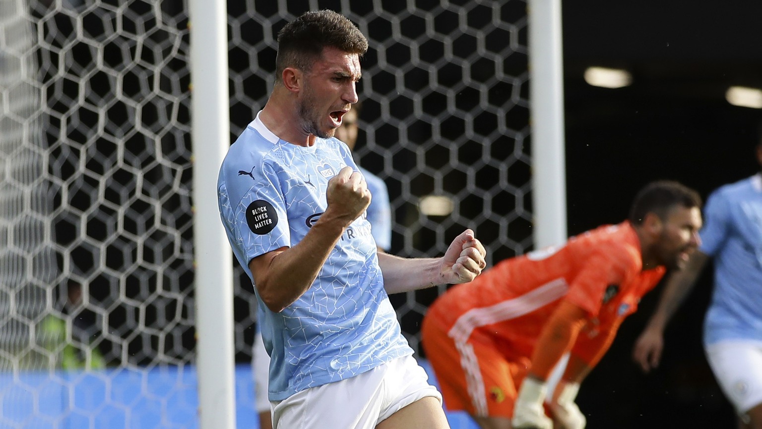 Manchester City&#039;s Aymeric Laporte celebrates after scoring his side&#039;s fourth goal during the English Premier League soccer match between Watford and Manchester City at the Vicarage Road Stad ...