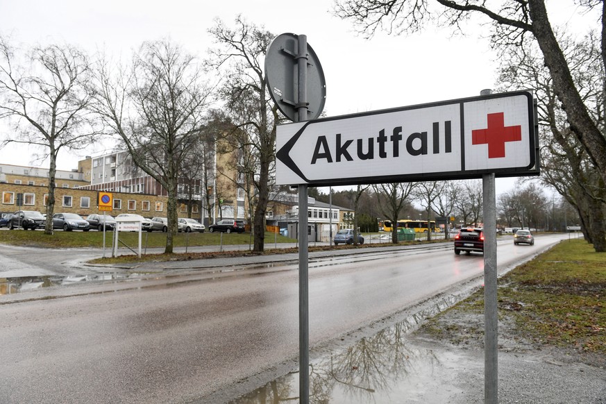 epa07261629 A sign leads to the emergency ward at the hospital in Enkoping, Sweden, 04 January 2018. The hospital had received a case of suspected Ebola, according to officials of the Uppsala region.  ...