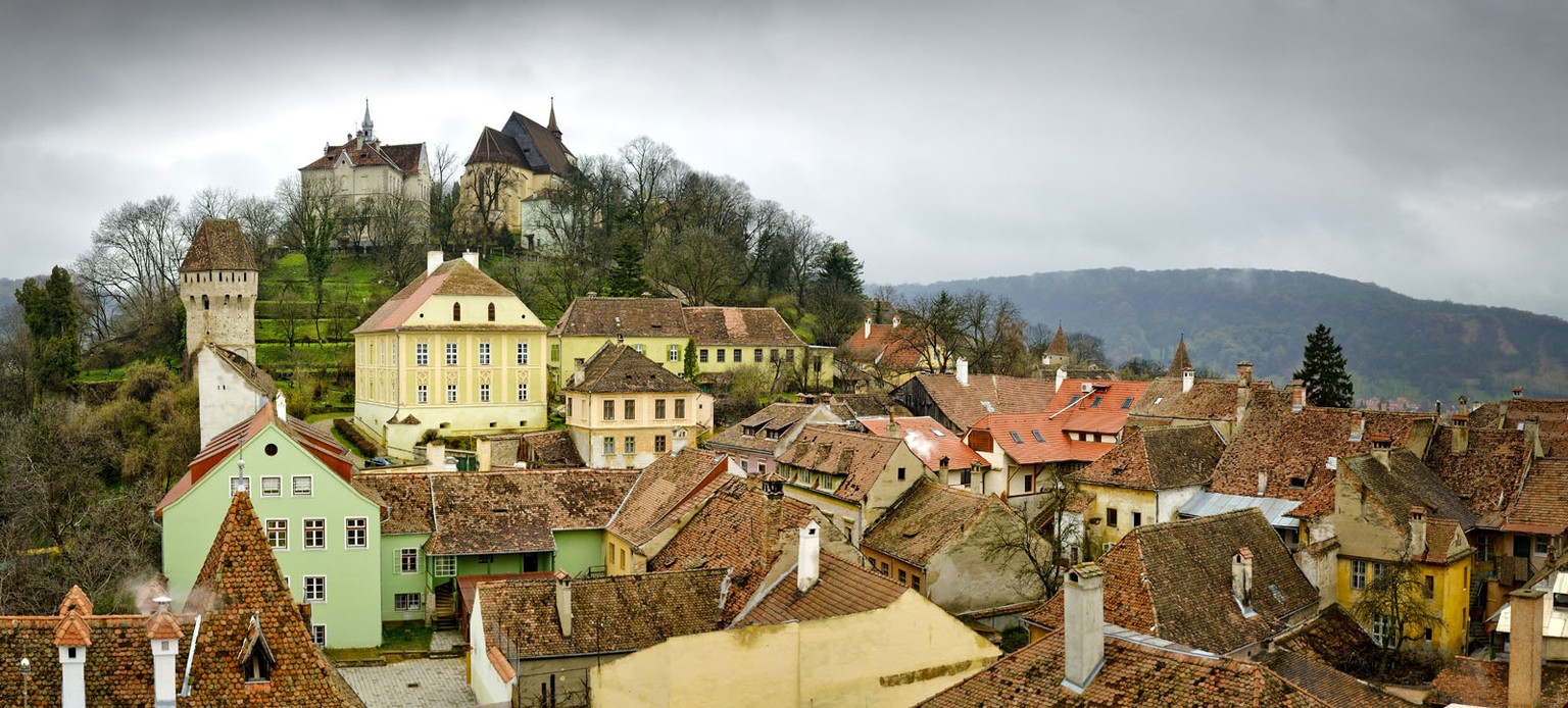 Panorama on a moody day with dramatic sky, Sighisoara, mediaval town in Transylvania, Romania