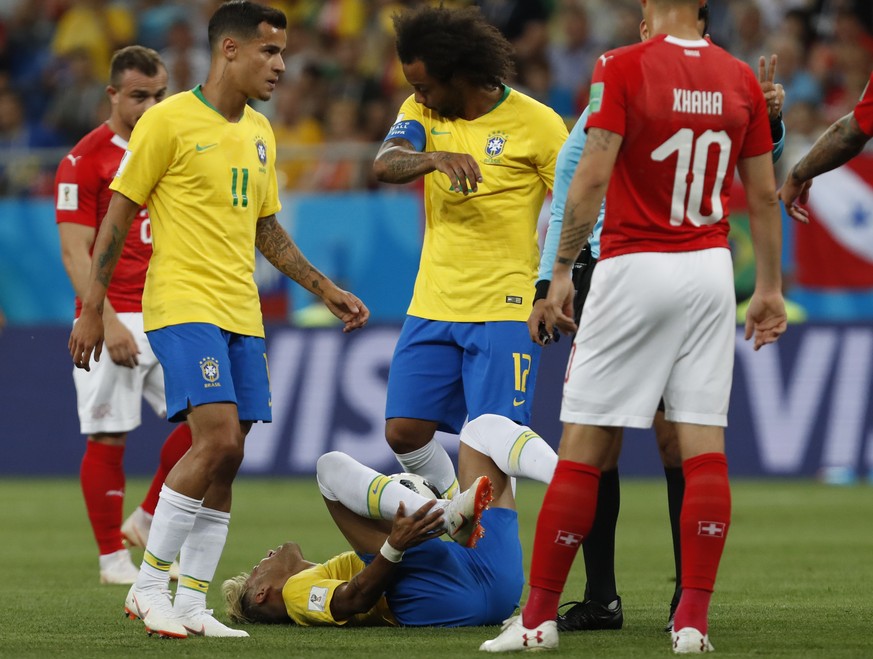 Brazil&#039;s Neymar lies on the ground during the group E match between Brazil and Switzerland at the 2018 soccer World Cup in the Rostov Arena in Rostov-on-Don, Russia, Sunday, June 17, 2018. (AP Ph ...