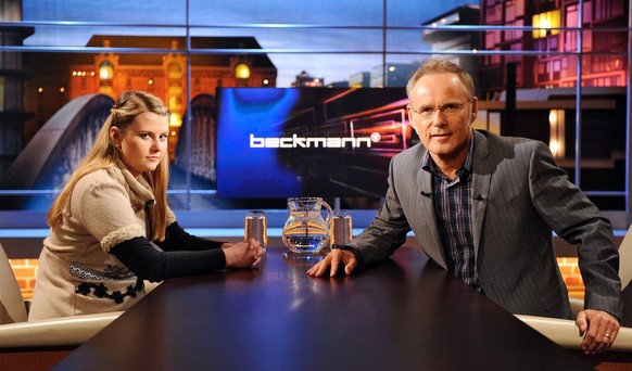 epa02317660 A picture dated 04 September 2010 shows Austrian Natascha Kampusch sitting in the television studio with German moderator Reinhold Beckmann prior to the recording of TV talkshow &#039;Beck ...