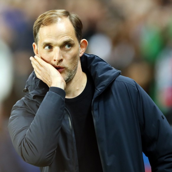 PSG coach Thomas Tuchel looks on ahead of the French League One soccer match between Paris-Saint-Germain and Strasbourg at the Parc des Princes stadium in Paris, France, Sunday, April 7, 2019. (AP Pho ...