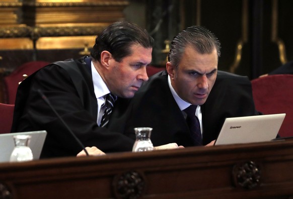epa07363970 Secretary General of the far right party Vox, Javier Ortega Smith (R), and the party&#039;s Judicial Secretary, Pedro Fernandez (L), attend as private prosecution the so-called &#039;proce ...