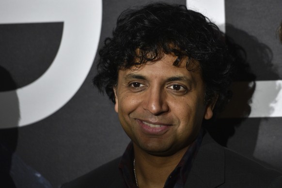 Director Night Shyamalan poses during a photocall for the French premiere of &#039;Glass&quot; directed by Night Shyamalan, in Paris, Monday, Jan. 07, 2019. (AP Photo/Francois Mori))
