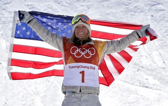 Jamie Anderson, of the United States, celebrates winning gold after the women&#039;s slopestyle final at Phoenix Snow Park at the 2018 Winter Olympics in Pyeongchang, South Korea, Monday, Feb. 12, 201 ...