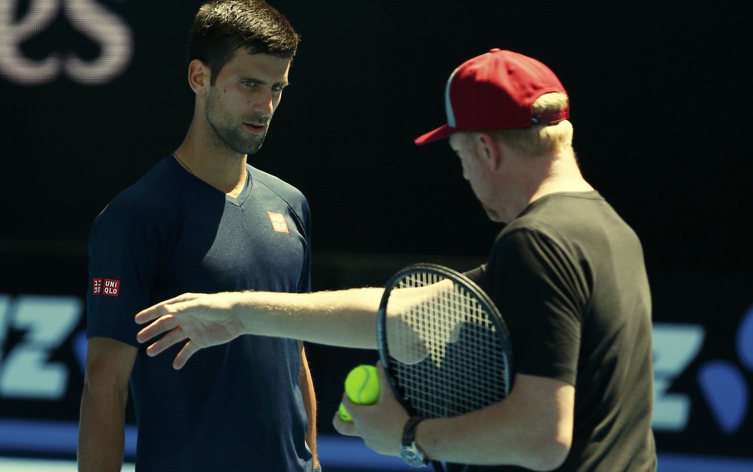Serbia&#039;s Novak Djokovic listens to his coach Boris Becker during a practice session at Melbourne Park, Australia, January 16, 2016. The Australian Open tennis tournament starts January 18. REUTER ...