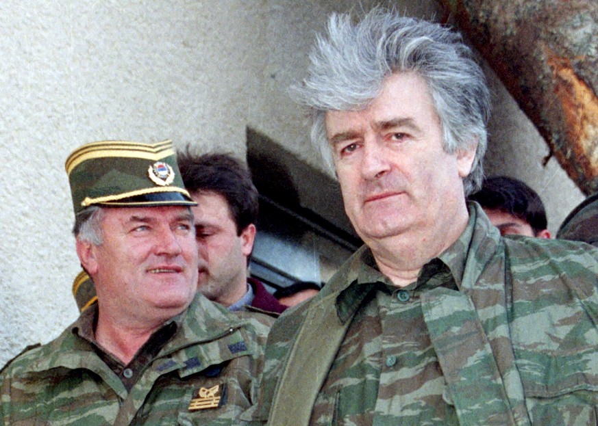 Bosnian Serb wartime leader Radovan Karadzic (R) and his general Ratko Mladic are seen on Mountain Vlasic in Banja Luka in Bosnia and Herzegovina, in this April 1995 file photo. Prosecutors at a U.N.  ...
