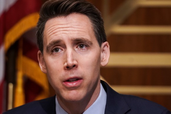 epa08888004 Sen. Josh Hawley (R-Mo.) asks questions during a Senate Homeland Security &amp; Governmental Affairs Committee hearing to examine baseless claims of voter irregularities in the 2020 electi ...