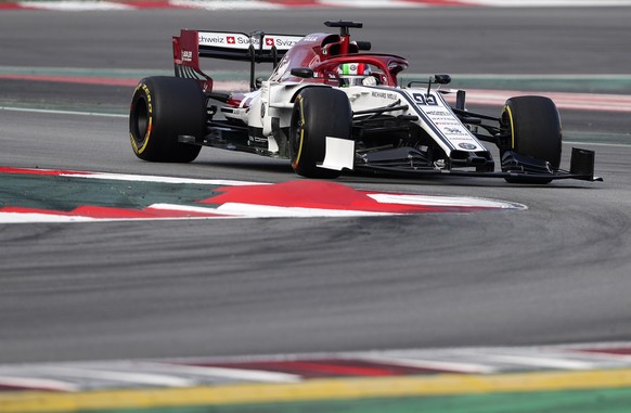 Alfa Romeo driver Antonio Giovinazzi of Italy takes a curve during a Formula One pre-season testing session at the Barcelona Catalunya racetrack in Montmelo, outside Barcelona, Spain, Tuesday, Feb.19, ...