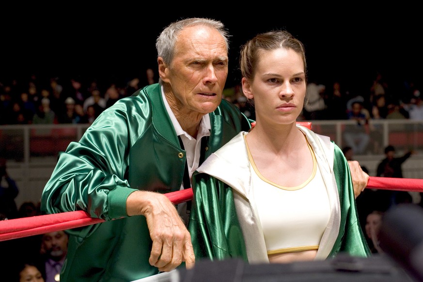 In this undated photo released by Warner Bros. Pictures, Clint Eastwood and Hilary Swank appear in a scene from &quot;Million Dollar Baby.&quot; The film was nominated for best dramatic picture, Swank ...