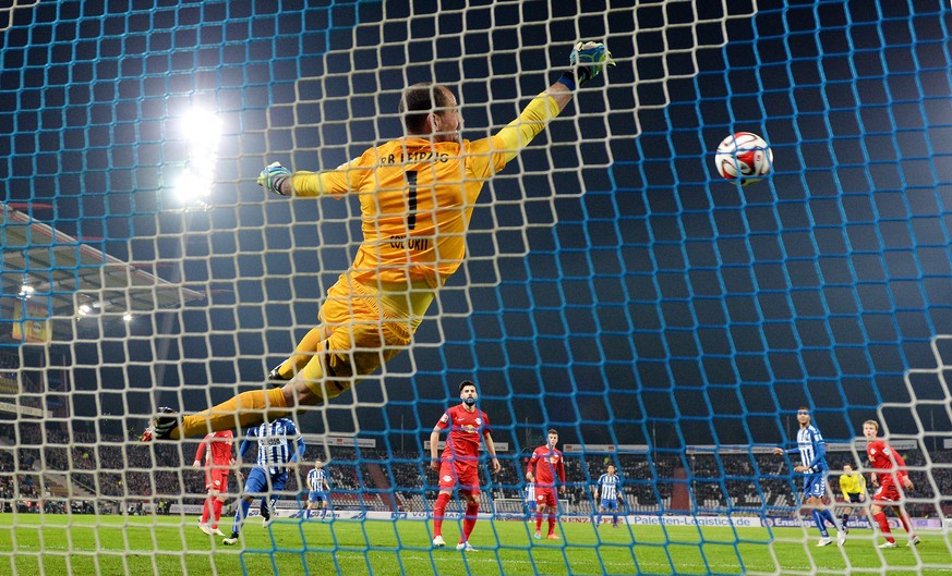 KARLSRUHE, GERMANY - MARCH 09: Goalkeeper Fabio Coltorti of RB Leipzig saves the ball during the Second Bundesliga match between Karlsruher SC and RB Leipzig at Wildpark Stadium on March 9, 2015 in Ka ...