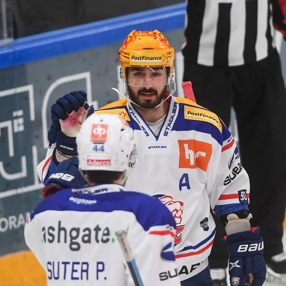 Zurich&#039;s Top Scorer Denis Hollenstein, in the center, celebtate with teammate the 0-1 goal against Lugano