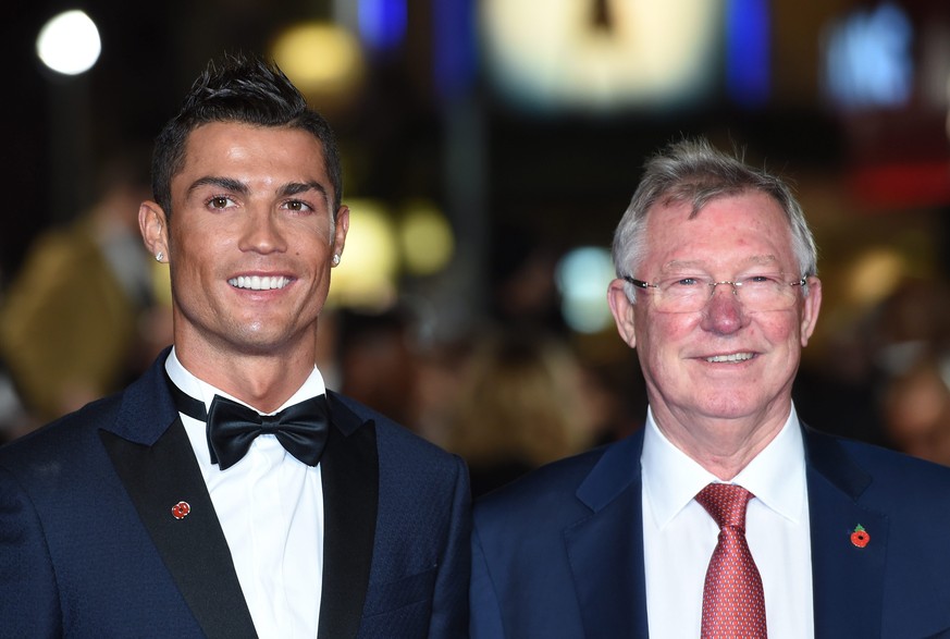 epa05018374 Real Madrid&#039;s Portuguese striker Cristiano Ronaldo (L) and former Manchester United manager, Sir Alex Ferguson (R) arrive for the World Premiere of &#039;Ronaldo&#039; at Leicester Sq ...