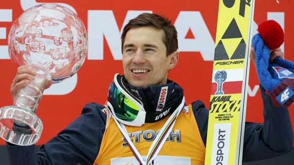 Poland&#039;s Kamil Stoch celebrates his overall victory at the ki Jumping World Cup event in Planica, Slovenia, Sunday, March 25, 2018. (AP Photo/Darko Bandic)