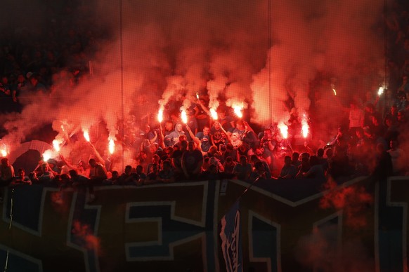 epa07565616 Fans of FC Zenit St. Petersburg celebrate the victory of the Russian Premier League title, following the match against FC CSK Moscow, in St. Petersburg, Russia, 12 May 2019. EPA/ANATOLY MA ...