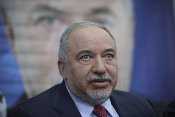 FILE - In this May 30, 2019 file photo, Former Israeli Defense Minister and Yisrael Beiteinu party leader Avigdor Lieberman speaks to journalists during a press conference in Tel Aviv, Israel. Israel  ...