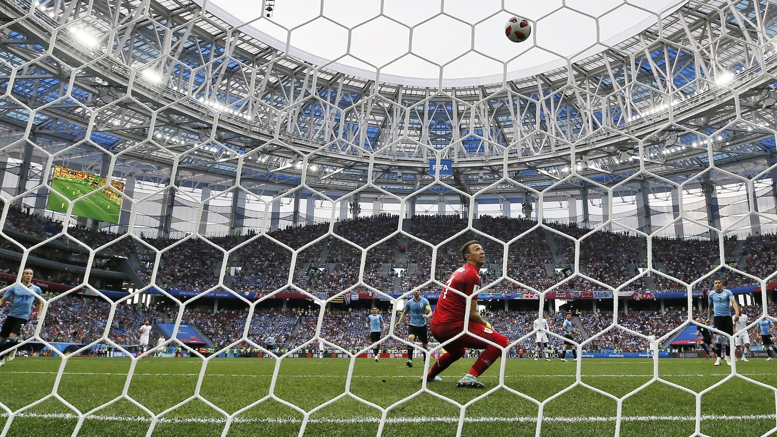 epa06868609 Goalkeeper Fernando Muslera of Uruguay can not stop the ball as France go 2-0 up during the FIFA World Cup 2018 quarter final soccer match between Uruguay and France in Nizhny Novgorod, Ru ...