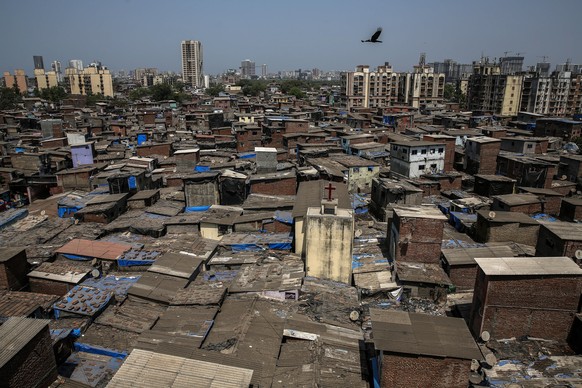 epa08355092 A general view of the Dharavi slums, considered to be one of the largest slums in the world, during the coronavirus emergency lockdown in Mumbai, India, 10 April 2020. India is under a nat ...