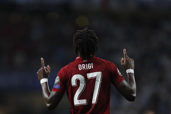 Liverpool&#039;s Divock Origi celebrates after scoring his side&#039;s second goal during the Champions League final soccer match between Tottenham Hotspur and Liverpool at the Wanda Metropolitano Sta ...