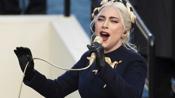 FILE - In this Wednesday, Jan. 20, 2021 file photo, Lady Gaga sings the national anthem during President-elect Joe Biden&#039;s inauguration at the U.S. Capitol in Washington. Lady Gaga&#039;s two Fre ...