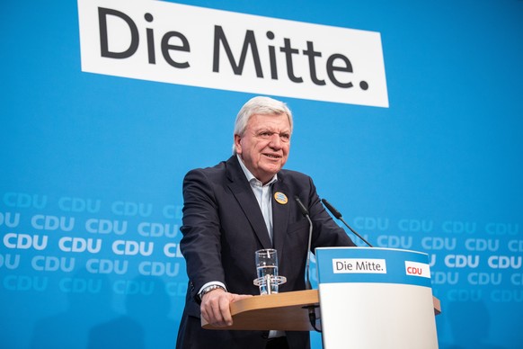 epa07109877 Volker Bouffier, Deputy Leader of the Christian Democratic Union (CDU) and Hesse Premier, delivers a statement with German Chancellor Angela Merkel (not pictured) after a board meeting at  ...