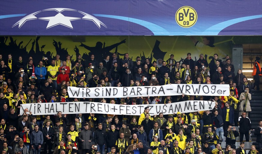epa05904700 Borussia&#039;s supporters hold a banner reading &#039;We are Bartra, We stand together&#039; prior to the UEFA Champions League quarter final, first leg soccer match between Borussia Dort ...