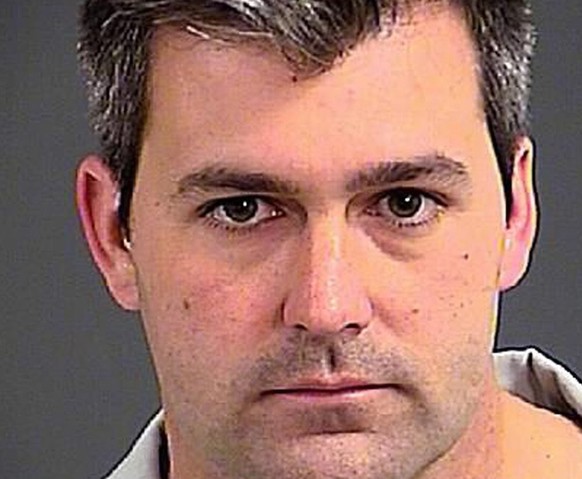 epa04695048 A handout booking photo issued by the Charleston County Sheriff&#039;s Office shows North Charleston police officer Michael Thomas Slager, in North Charleston, South Carolina, USA, 07 Apri ...